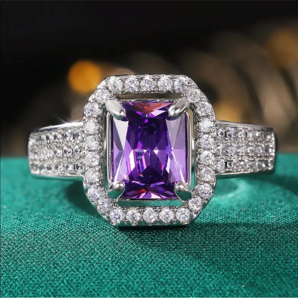 Huitan Silver Ring with Purple Center Stone and Clear Accents